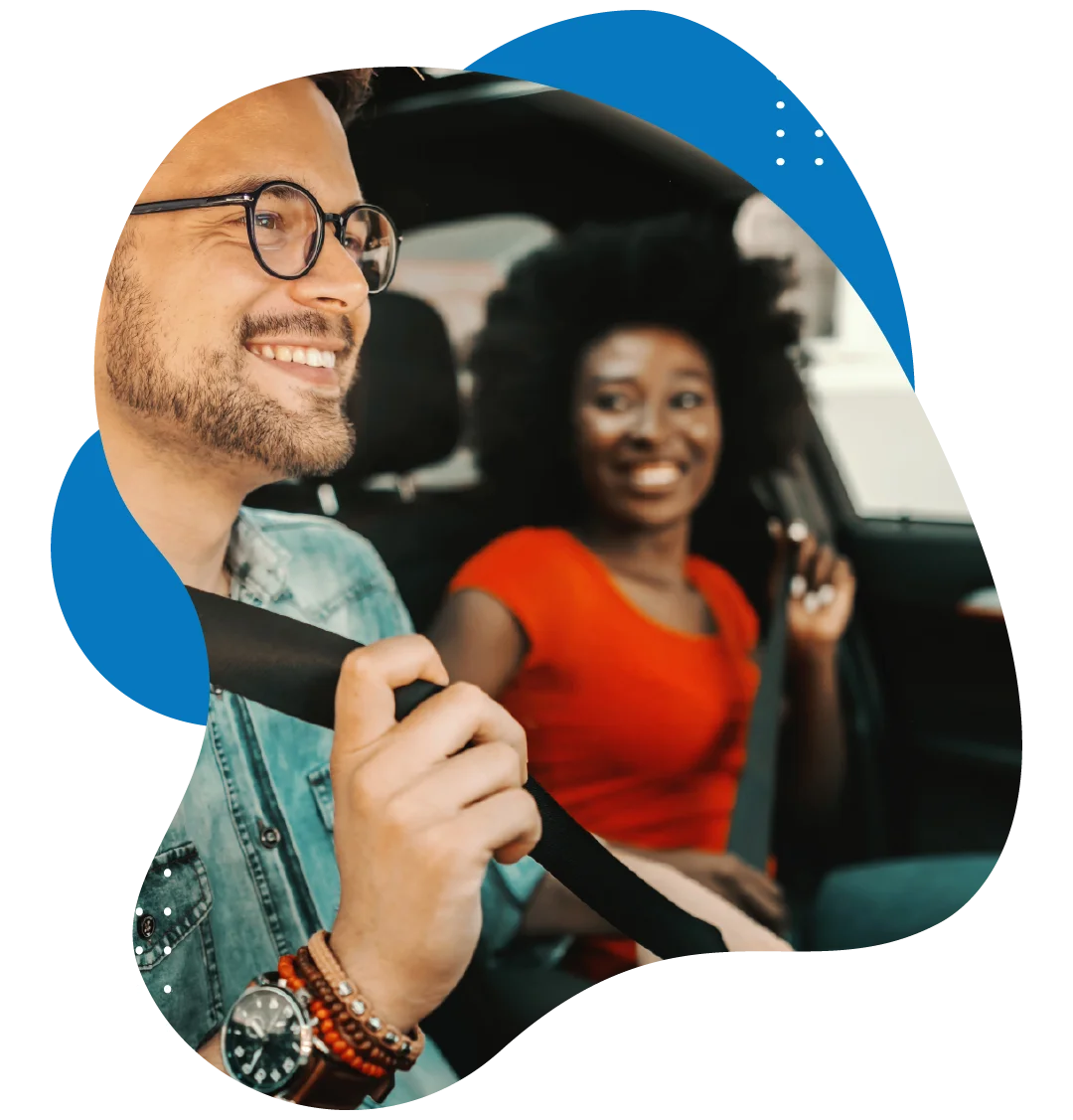 Smiling couple driving their car